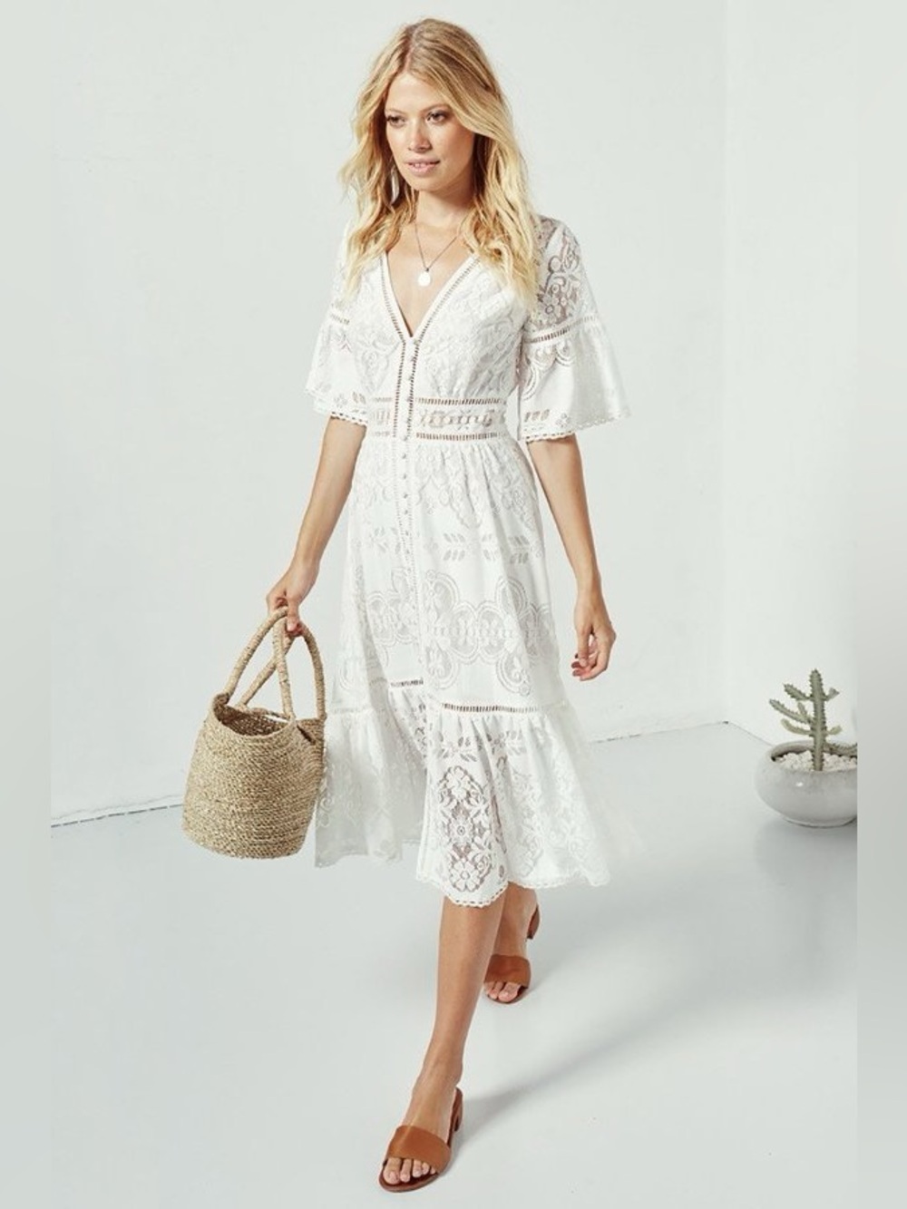 Like spell and gypsy White Lace Midi Dress with V-Neck and Flutter Sleeves